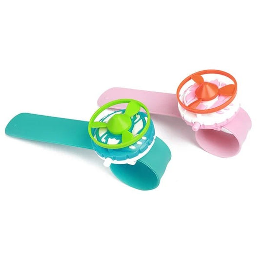 Snaparmbånd med roterende legetøj